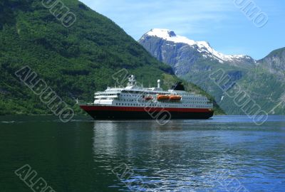 Tourist ship in Geiranger fjord Tourist ship in Geiranger fjord