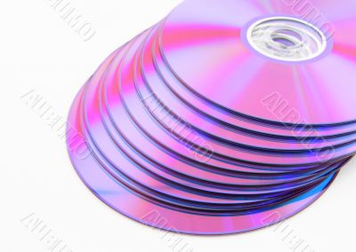 Stack of vibrant purple DVDs or CDs