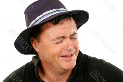 Man In Hat Crying