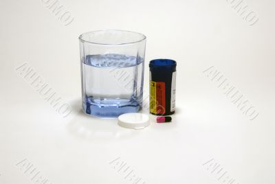 Pill with water