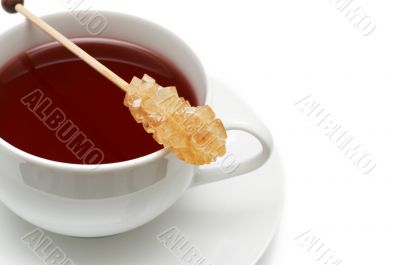 Closeup of red tea with sugar