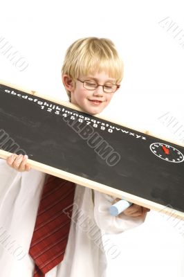 boy plays with black board
