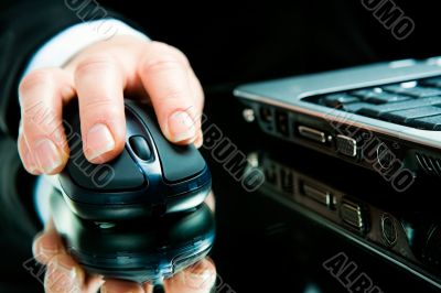 Hand over computer mouse