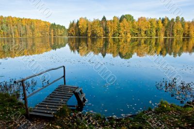 Autumn on a quiet forest lake