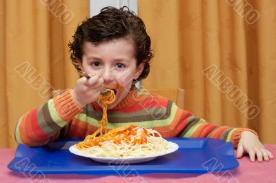 Child eating in his house Child eating in his house