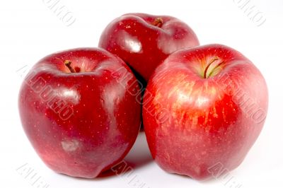 Three red apples