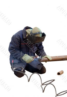 man cutting a pipe