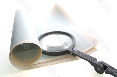 magnifying glass over the paper