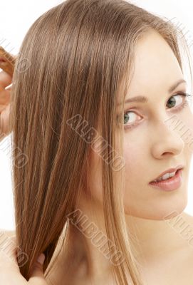 combing woman combing woman