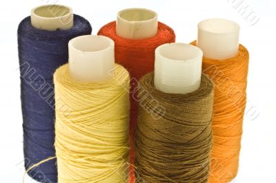 five spools of thread