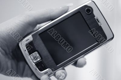 wireless PDA smart phone in woman hand