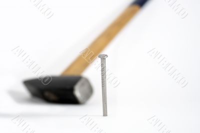 Nail and hammer Nail and hammer
