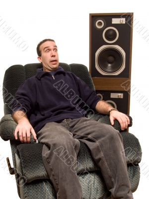Caucasian Man Listening To Music