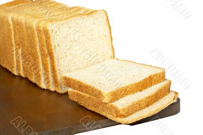 Slices of bread on plank