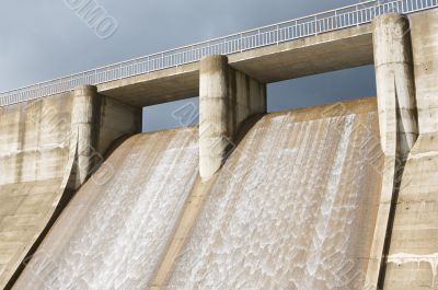 Dam water to generate energy