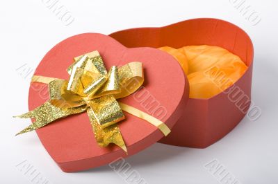 opened heart box with ribbon