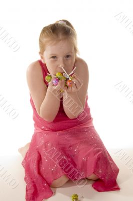 little girl holding a lot of lollypops little girl holding a lot of lollypops