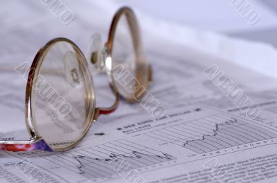 Business Magazine and glasses