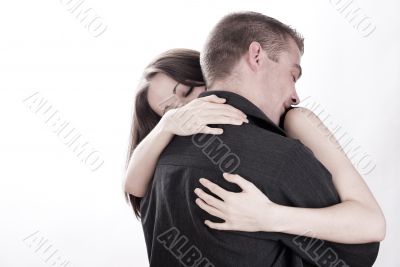 Man is holding his girlfriend