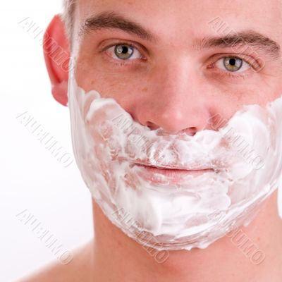 Shaving young man