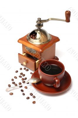 old coffee mill with Beans and cup of coffee
