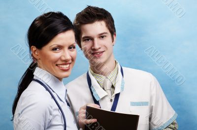 young caucasian doctor with assistant