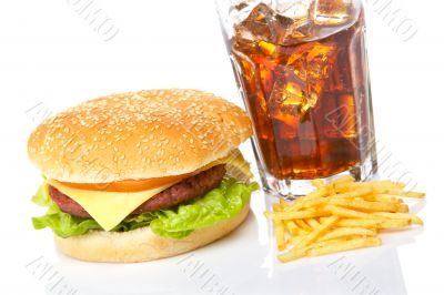 Cheeseburger, soda and french fries