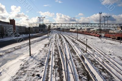 Railway tracks cover by snow in winter