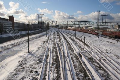 Railway tracks cover by snow in winter