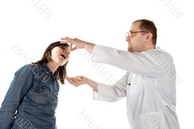 Doctor gives patient of a tablet