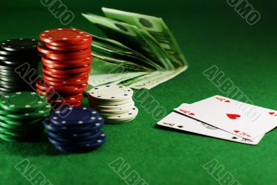 two aces on the green table