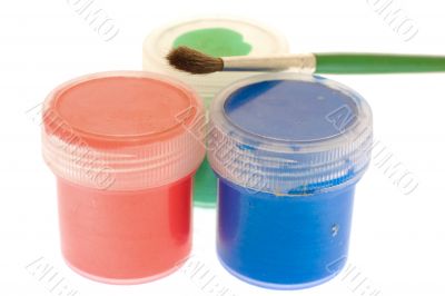 jars with paint of three colors