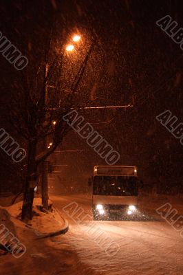 The bus in winter street.