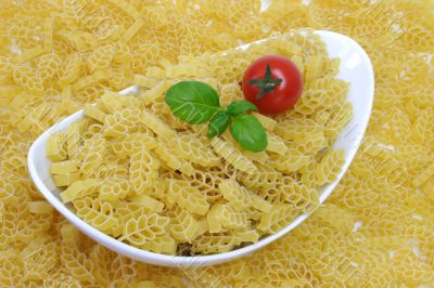 Noodles with tomato in a bowl