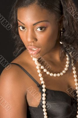 Beautiful black girl in black lingerie (portrait)