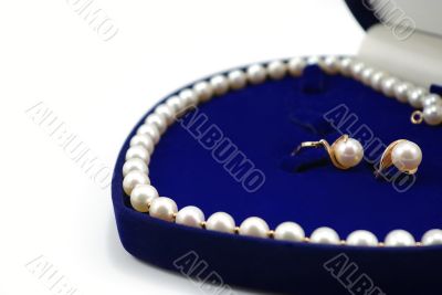 pearl necklace in blue heart-shaped box