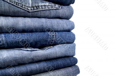 stack of blue jeans