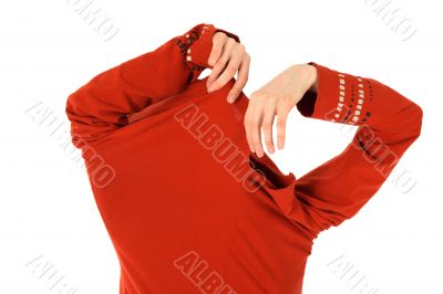 Funny woman takes off an orange shirt Funny woman takes off an orange shirt