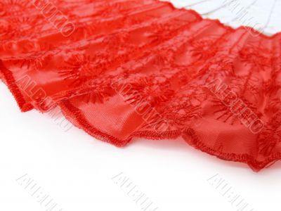 Red fan on white background