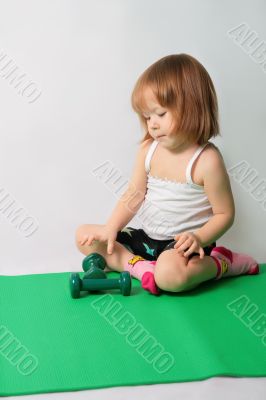 Small girl intends  to power training