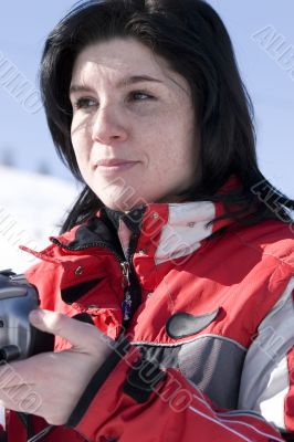 Attractive woman holding a camera