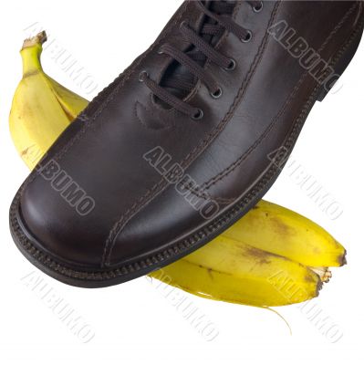Isolated shoe on banana peel