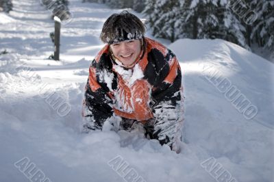 A health lifestyle image of young snowboarder