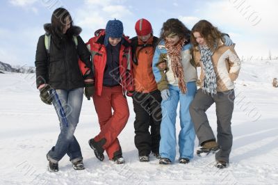 Group of sports teenagers in mountains