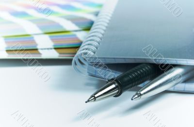 blank notrbook, pens, color guide