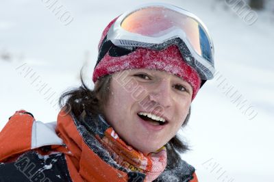 A health lifestyle image of young snowboarder