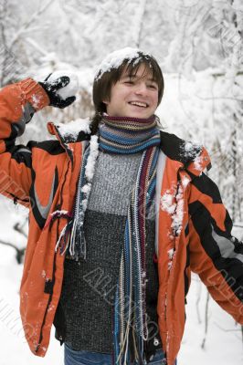 teens boy in scarf with snowball