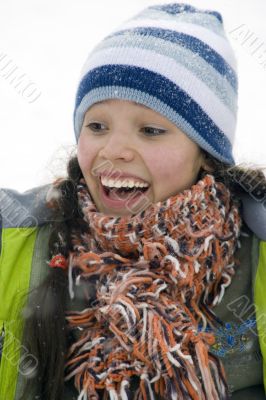 Laughing beautiful girl snowborder