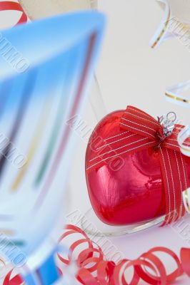 glass of champagne with a red heart glass of champagne with a red heart