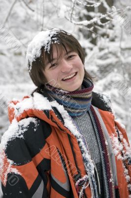 teens boy in scarf  outdoors in winter